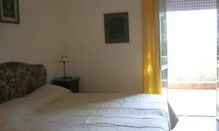 Rexer-Roma-Camera-matrimoniale-in-villa-CAMERA-DA-LETTO