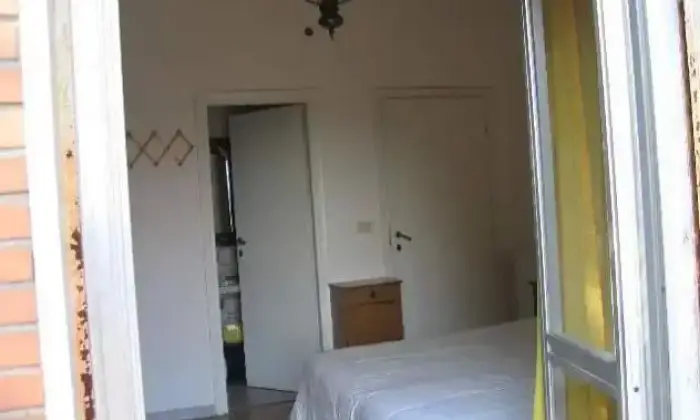 Rexer-Roma-Camera-matrimoniale-in-villa-CAMERA-DA-LETTO