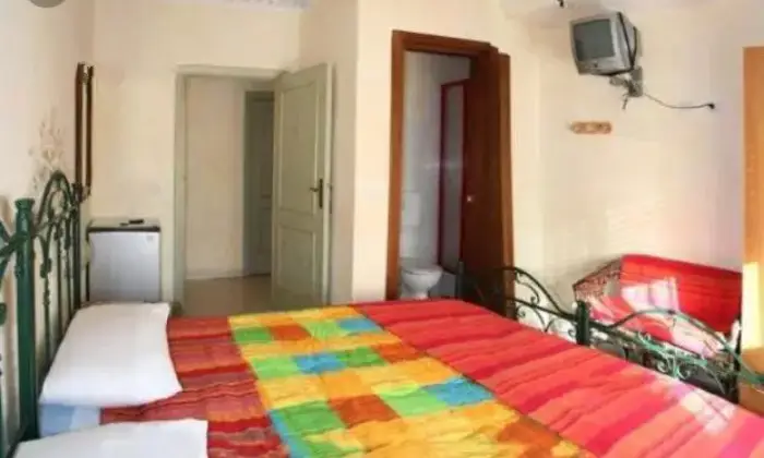 Rexer-Alghero-Panoramico-attico-vista-mare-CAMERA-DA-LETTO