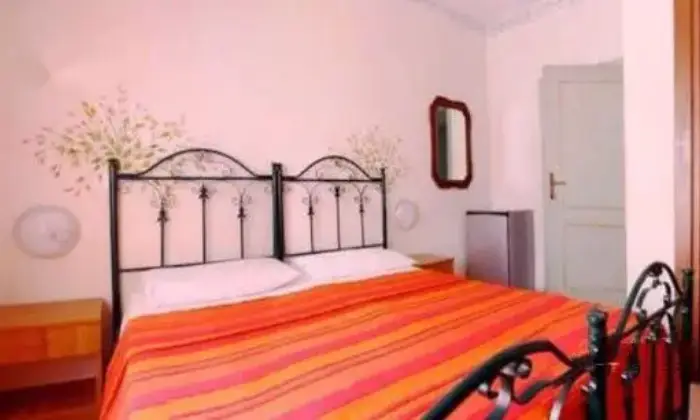 Rexer-Alghero-Panoramico-attico-vista-mare-CAMERA-DA-LETTO