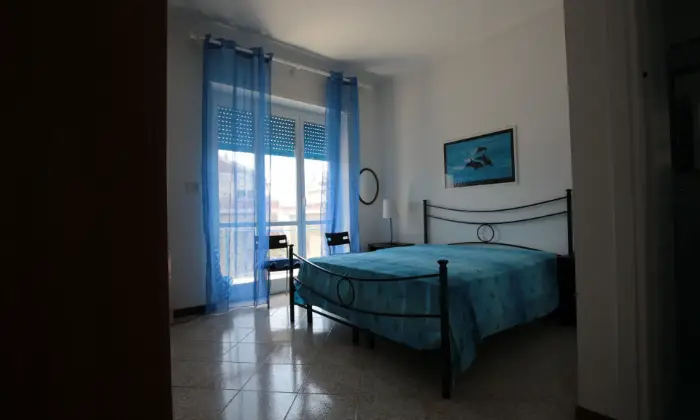 Rexer-Roma-Appartamento-vista-mare-CAMERA-DA-LETTO