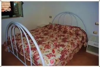 Rexer-Camerota-Grazioso-bilocale-vista-mare-con-posto-auto-CAMERA-DA-LETTO