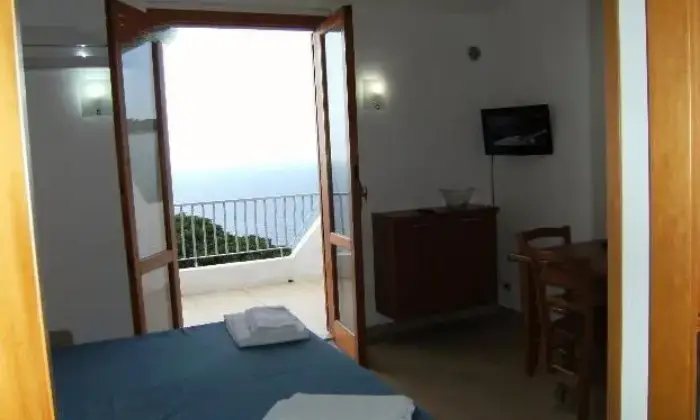 Rexer-Gioiosa-Marea-Monolocale-posti-letto-CAMERA-DA-LETTO