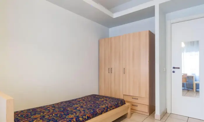 Rexer-Roma-Stanza-singola-con-bagno-privato-in-camera-CAMERA-DA-LETTO
