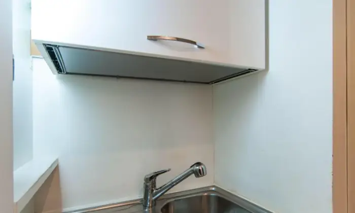 Rexer-Roma-Stanza-singola-con-bagno-privato-in-camera-CUCINA