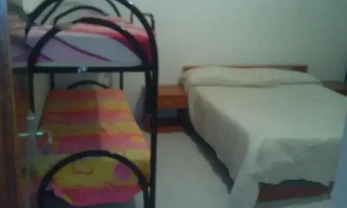Rexer-Santa-Maria-del-Cedro-Appartamento-a-metri-dal-mare-CAMERA-DA-LETTO