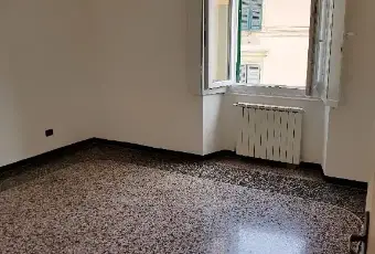 Rexer-Genova-Ampio-appartamento-CAMERA-DA-LETTO