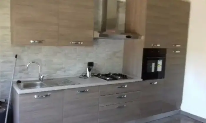 Rexer-Gissi-Trilocale-bilivello-con-terreno-CUCINA