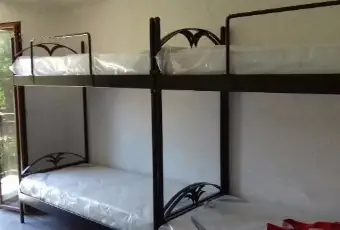 Rexer-Gissi-Trilocale-bilivello-con-terreno-CAMERA-DA-LETTO