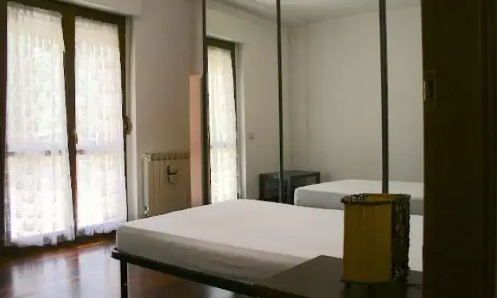 Rexer-Roma-Trilocale-con-giardino-CAMERA-DA-LETTO