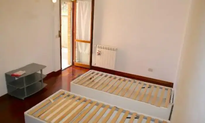 Rexer-Roma-Trilocale-con-giardino-CAMERA-DA-LETTO