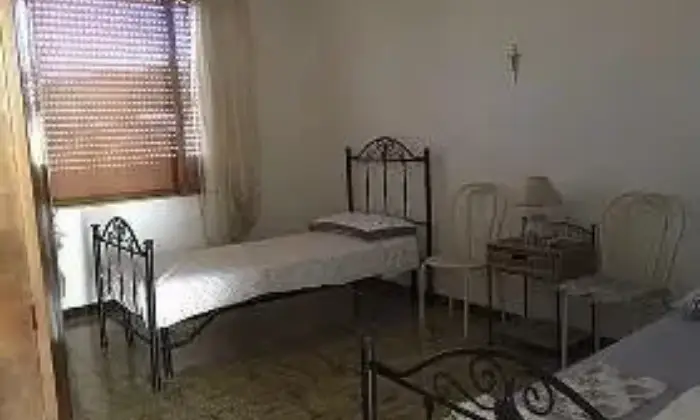 Rexer-Escalaplano-Ampio-appartamento-CAMERA-DA-LETTO