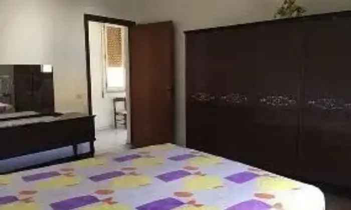 Rexer-Escalaplano-Ampio-appartamento-CAMERA-DA-LETTO