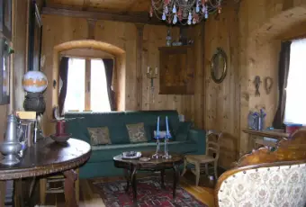 Rexer-Borca-di-Cadore-Appartamento-in-Cadore-SOGGIORNO-stube-con-rivestimento-originale-in-cirmolo-e-alcuni-mobili-antichi