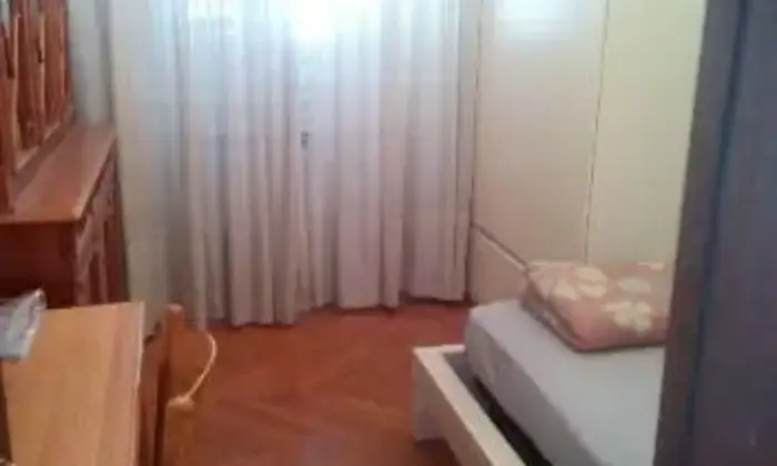 Rexer-Trieste-Appartamento-con-camere-e-bagni-CAMERA-DA-LETTO