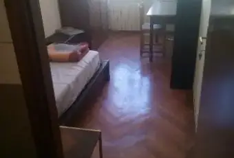 Rexer-Trieste-Appartamento-con-camere-e-bagni-CAMERA-DA-LETTO