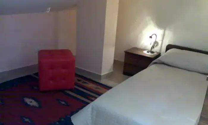 Rexer-Monreale-Mansarda-arredata-CAMERA-DA-LETTO