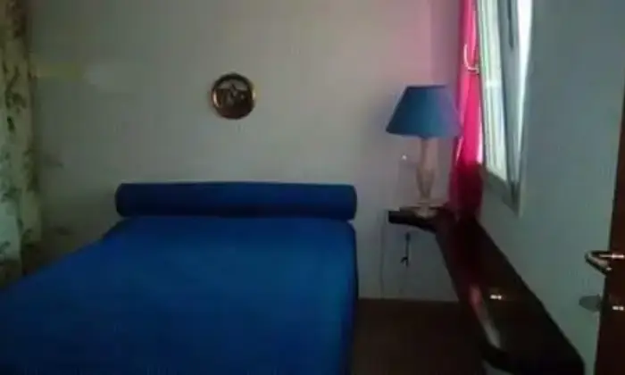 Rexer-Valledoria-Tranquillo-e-ampio-trilocale-vista-mare-CAMERA-DA-LETTO