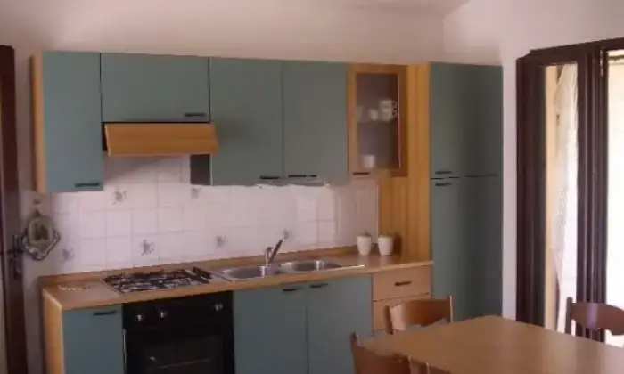 Rexer-San-Teodoro-Elegante-bilocale-vista-mare-CUCINA