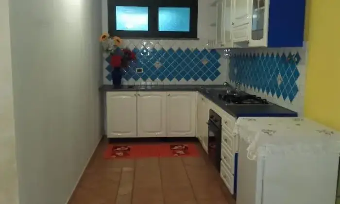 Rexer-San-Giovanni-Suergiu-Camera-doppia-in-appartamento-condiviso-CUCINA