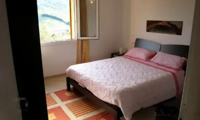 Rexer-Valledoria-Grazioso-bilocale-con-veranda-CAMERA-DA-LETTO
