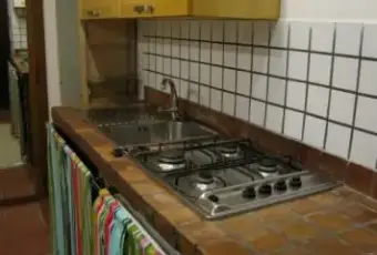Rexer-Roma-Signorile-bilocale-bilivello-CUCINA