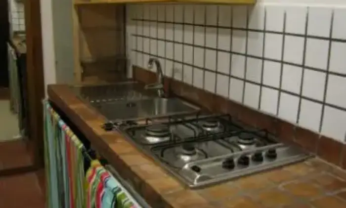 Rexer-Roma-Signorile-bilocale-bilivello-CUCINA