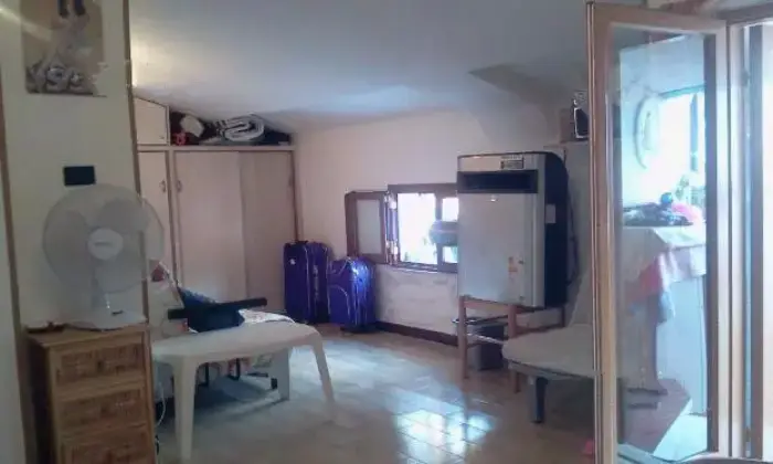 Rexer-Scalea-Appartamento-panoramico-con-mansarda-SALONE