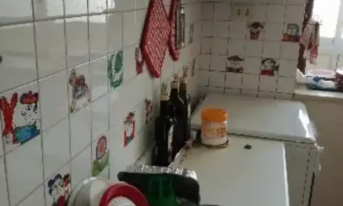 Rexer-Catania-Posto-letto-zona-corso-Sicilia-CUCINA