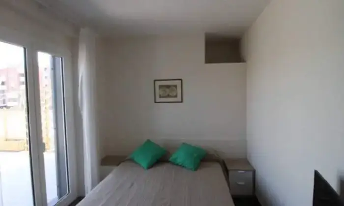 Rexer-Roma-Appartamento-moderno-zona-romanina-torvergata-CAMERA-DA-LETTO