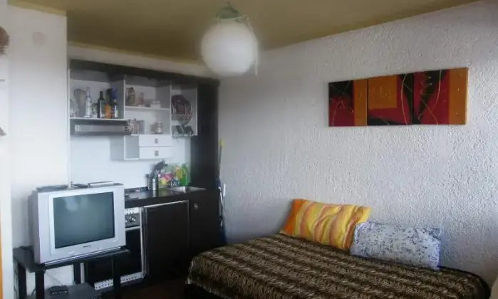 Rexer-Viola-Ampio-monolocale-panoramico-CAMERA-DA-LETTO