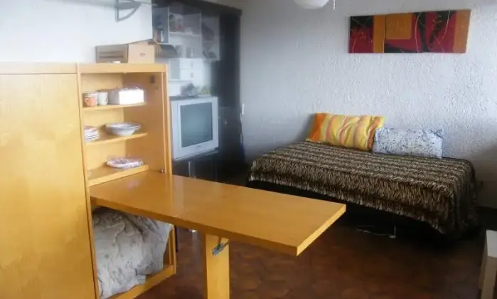 Rexer-Viola-Ampio-monolocale-panoramico-CAMERA-DA-LETTO