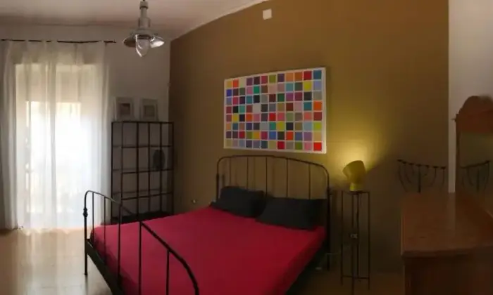 Rexer-Caltanissetta-Stanza-luminosa-e-confortevole-CAMERA-DA-LETTO