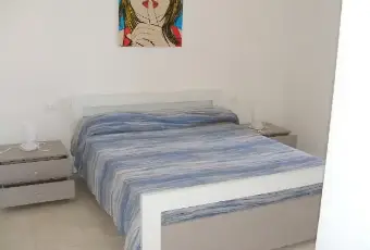 Rexer-Castagneto-Carducci-Appartamento-con-terrazza-panoramica-CAMERA-DA-LETTO