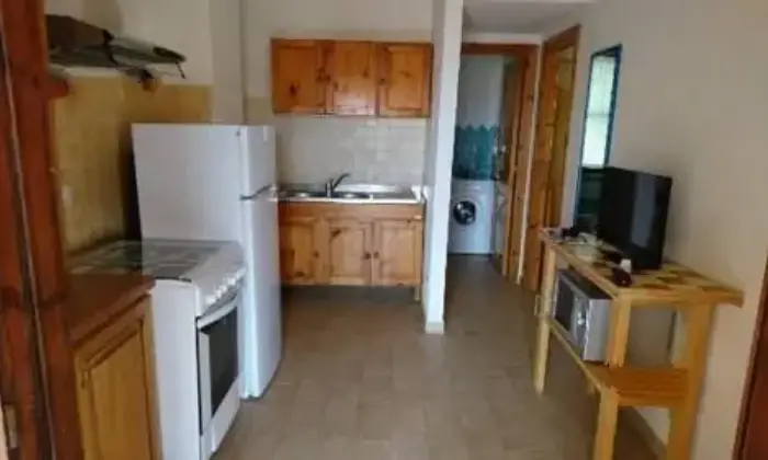 Rexer-Budoni-Villetta-a-schiera-a-metri-dalla-spiaggia-e-dalla-pineta-CUCINA