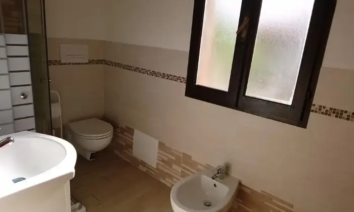 Rexer-Budoni-Villetta-a-schiera-a-metri-dalla-spiaggia-e-dalla-pineta-BAGNO