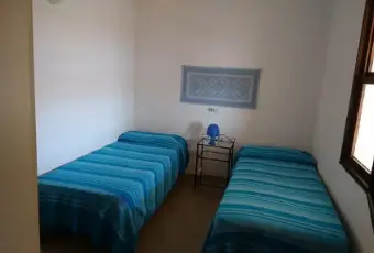 Rexer-Budoni-Villetta-a-schiera-a-metri-dalla-spiaggia-e-dalla-pineta-CAMERA-DA-LETTO