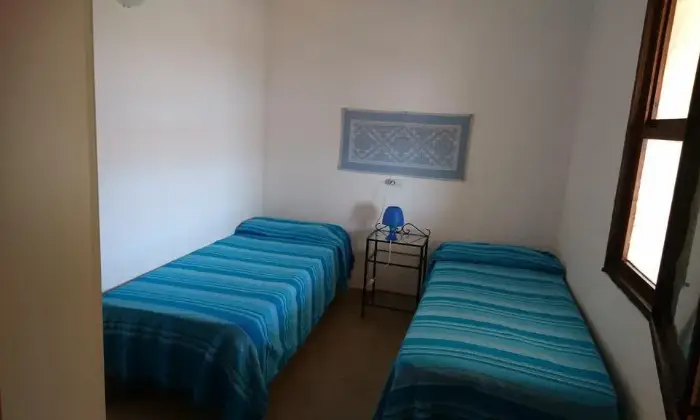 Rexer-Budoni-Villetta-a-schiera-a-metri-dalla-spiaggia-e-dalla-pineta-CAMERA-DA-LETTO
