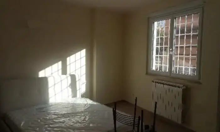 Rexer-Roma-Appartamento-San-Paolo-studenti-CAMERA-DA-LETTO