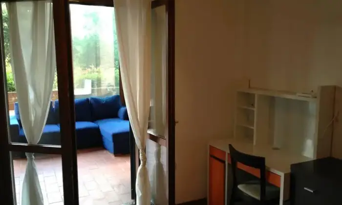 Rexer-Roma-Trilocale-arredato-CAMERA-DA-LETTO