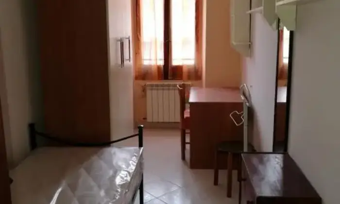 Rexer-Roma-Trilocale-ristrutturato-CAMERA-DA-LETTO