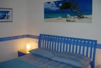 Rexer-Stintino-Delizioso-bilocale-vista-mare-vicino-alla-spiaggia-CAMERA-DA-LETTO