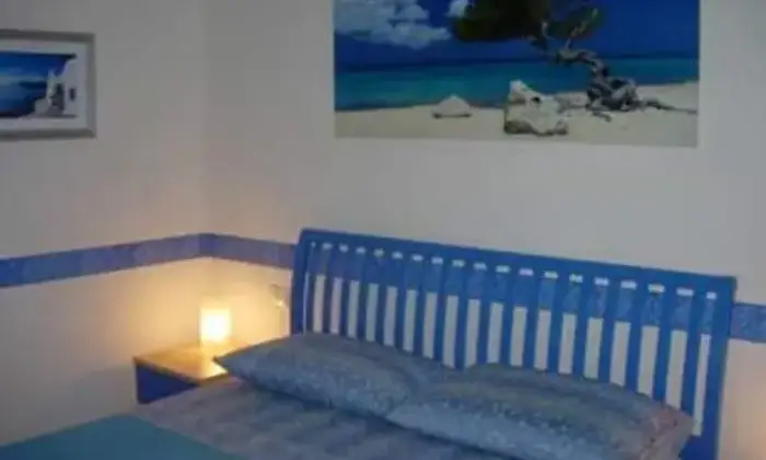 Rexer-Stintino-Delizioso-bilocale-vista-mare-vicino-alla-spiaggia-CAMERA-DA-LETTO