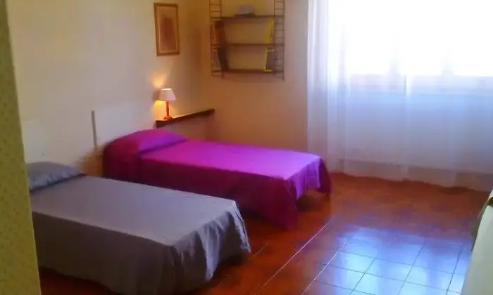 Rexer-Calasetta-Accogliente-e-luminoso-trilocale-vicino-alla-spiaggia-CAMERA-DA-LETTO