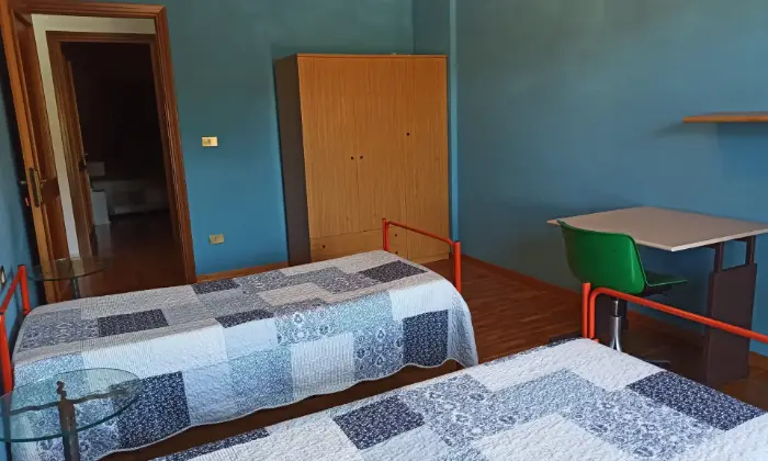 Rexer-LAquila-Ampio-quadrilocale-in-zona-servitissima-CAMERA-DA-LETTO