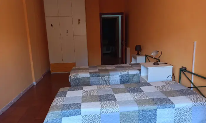 Rexer-LAquila-Ampio-quadrilocale-in-zona-servitissima-CAMERA-DA-LETTO
