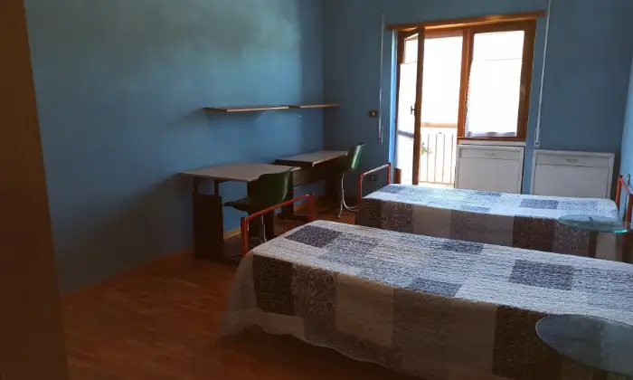 Rexer-LAquila-Ampio-quadrilocale-in-zona-servitissima-CAMERA-DA-LETTO