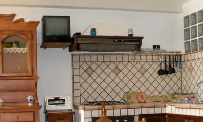 Rexer-Villasimius-Bilocale-accessoriato-e-climatizzato-centrale-CUCINA