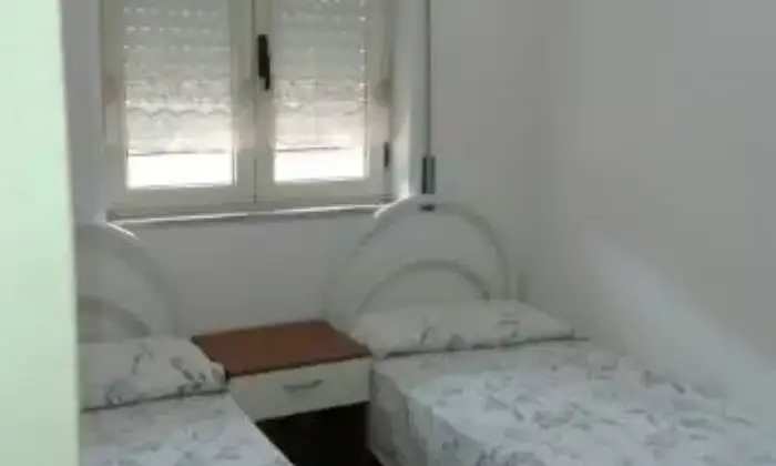 Rexer-Bosa-Accogliente-appartamento-per-il-carnevale-bosano-CAMERA-DA-LETTO