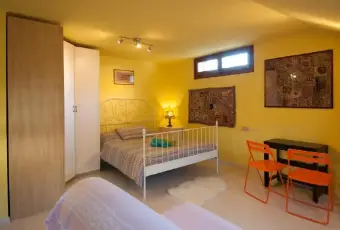 Rexer-SaintPierre-Luminosa-mansarda-mq-a-SaintPierre-CAMERA-DA-LETTO